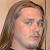An old picture of Marc with long hair.